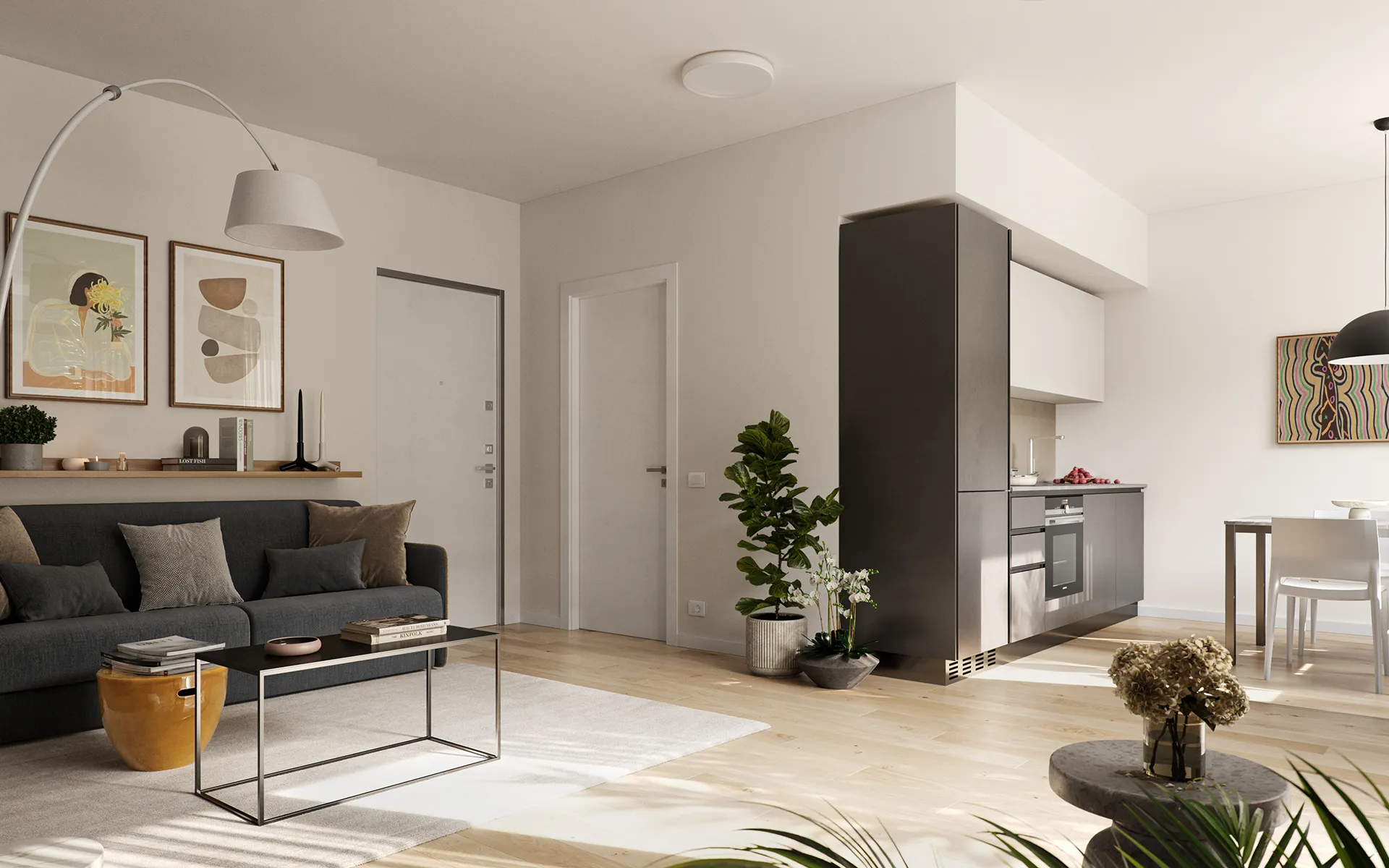 Interno di un appartamento tipo Studio con cucina su misura e arredi funzionali